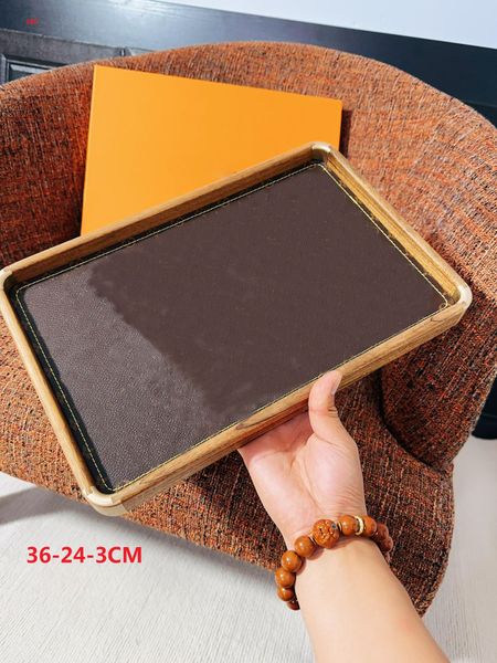 

Designer Hand-crafted elegant key placed in brown Black walnut storage trays