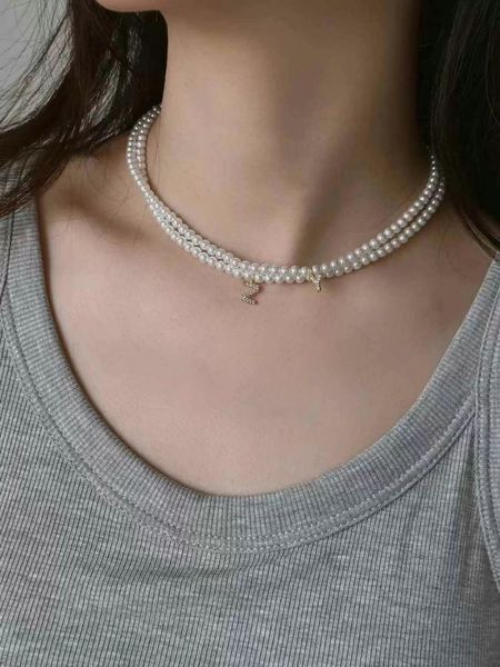 

Elegant 14k Gold Filled Necklace & Featuring High Quality Natural Freshwater Pearls (3-4mm)-traditional design