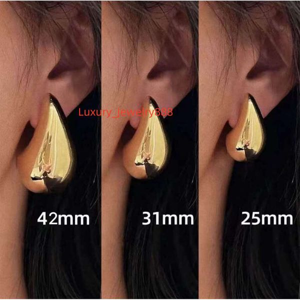 

Women's Gold-Plated Drop Earrings - Triangular Hoops with Shiny Finish for Parties & Gifts