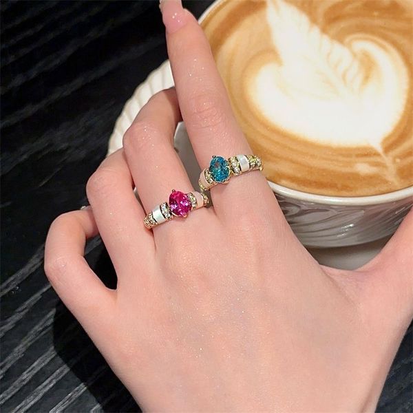 

Luxury Eco-Friendly Jewelry: 18K Gold Plated Brass Ring Featuring Blue Aquamarine & Pink Tourmalines
