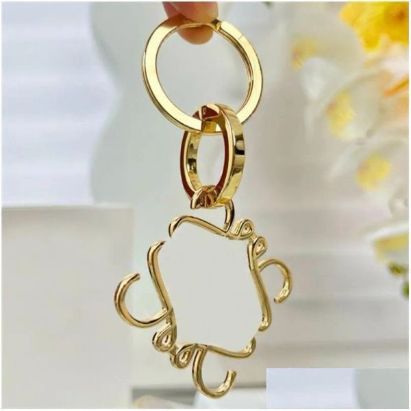 

Designer Keychain Anagram Womens Luxury Bag Charm Gold Sier Keyring Stainless Steel Mens Fashion Key Chain Classic Ring Drop
