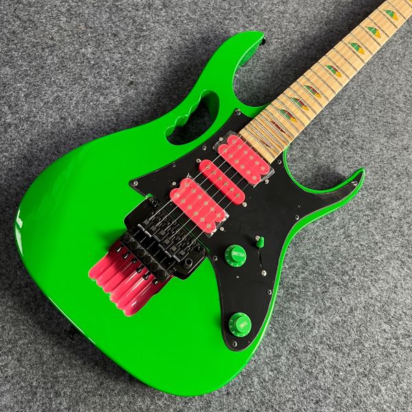 

Vibrant Green Double-Cut Guitar: Black Pickguard, Red Single-Coils & Colorful Inlays