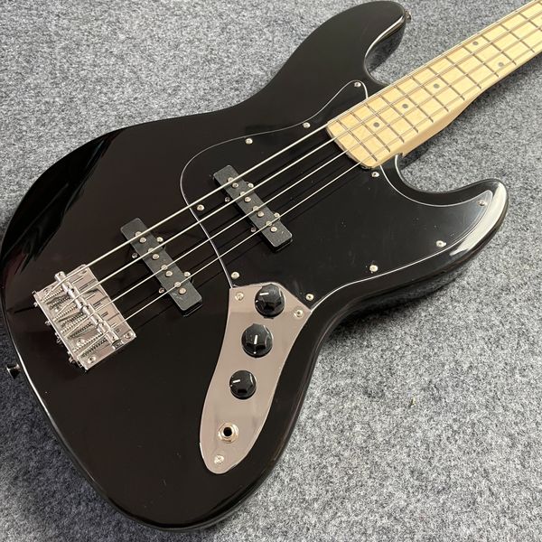

Glossy Black Offset Bass Guitar: Sleek Design, 2 Black Pickups & Metallic Bridge