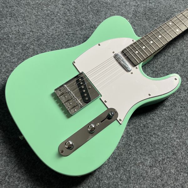 

Vibrant Light-Green Electric Guitar: White Pickguard, Rosewood Fretboard & Classic Bridge
