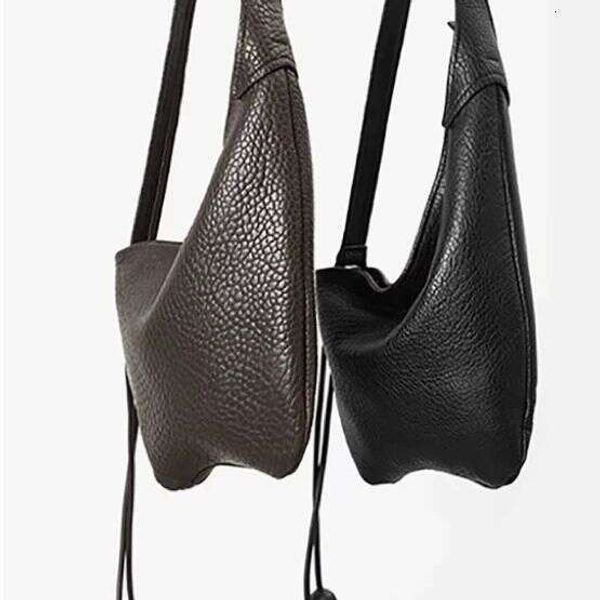 

Soft leather lychee pattern niche lazy style large capacity versatile crossbody armpit casual bag, Brown