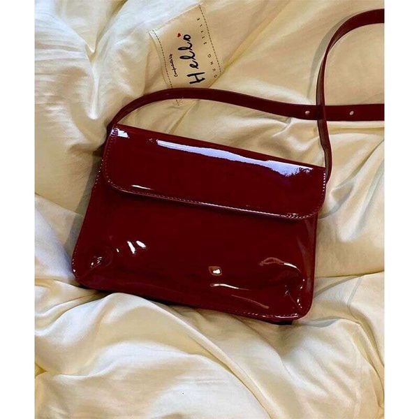 

Red patent leather small armpit 2025 new fashionable and versatile square hand-held shoulder crossbody bag, Cherry red
