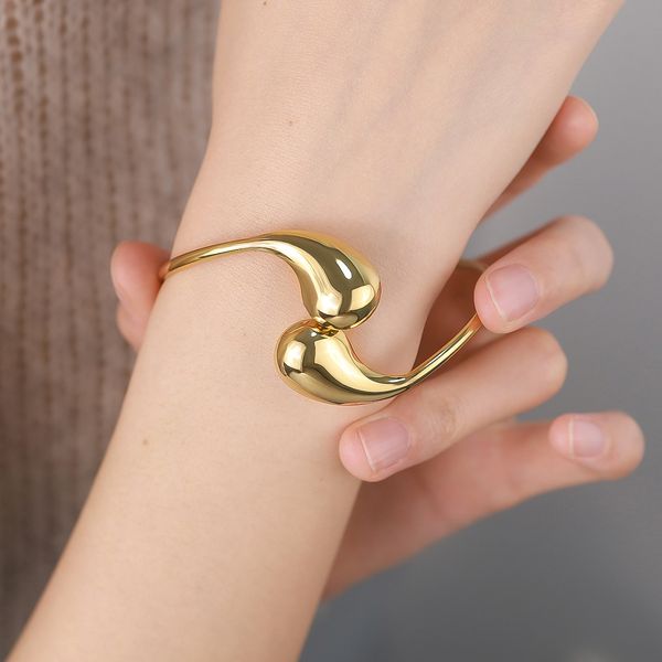 

Trendy Waterdrop Titanium Bracelet with Open Design, Adjustable Gold Bangle for Women, Fashionable Elastic Handcuff Jewelry Wholesale