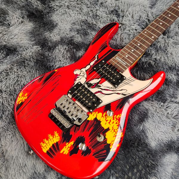

Vibrant Red Electric Guitar: Cartoon-Style Graphic, White Pickguard & Tremolo Bridge