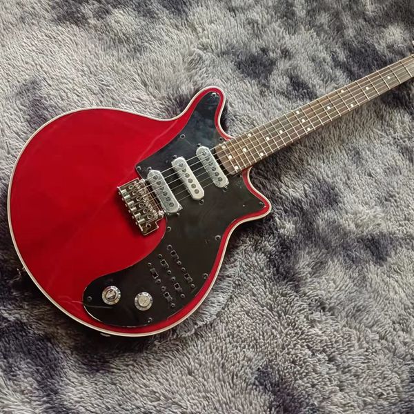 

Vibrant Red Rounded-Body Guitar: Black Pickguard, 3 Silver Pickups & White Dot Inlays