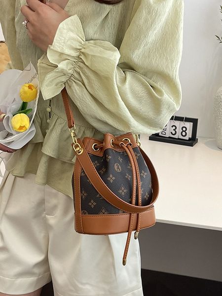 

Stylish Women's Crossbody Bucket Bag with Unique Letter Prints & Adjustable Strap for Any Occasion, White