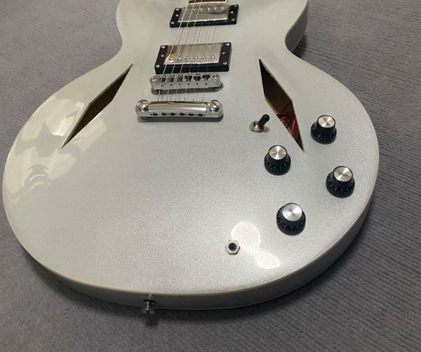 

Semi-Hollow Silver Guitar w/ F-Holes & Metallic Humbuckers - Jazz/Blues Pro
