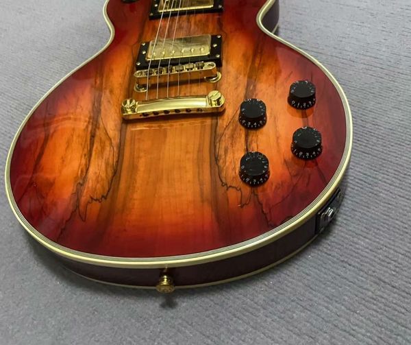 

Red-Brown Gradient Guitar w/ Wood Grain & Gold Hardware - Rock-Ready Tone
