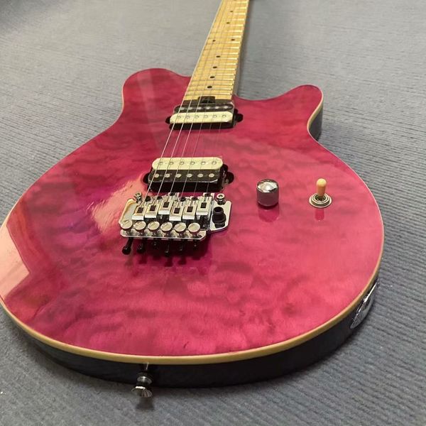 

Glossy Pink Quilted Electric Guitar: Single-Cutaway, Cream-Covered Humbuckers & Tremolo Bridge