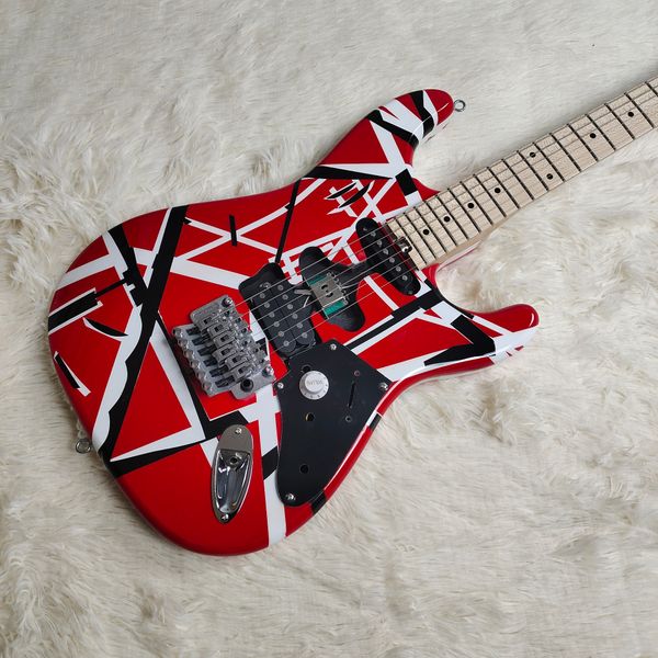 

Vivid Red Double-Cutaway Electric Guitar: Bold Geometric Patterns, Tremolo Bridge & Maple Neck