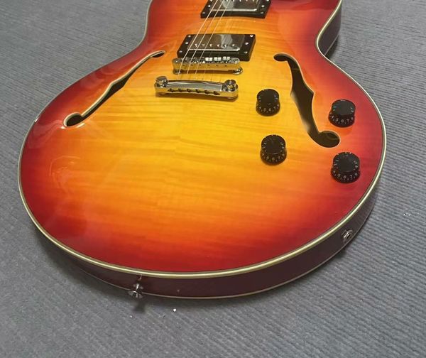 

Orange-Red Sunburst Semi-Hollow Guitar - F-Hole Acoustics & Dual Humbuckers | CITES
