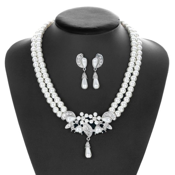 

Chic Bride's Choice: Lavish Pearl Jewelry Ensemble Including Pendant Necklace and Ear Studs, Silver