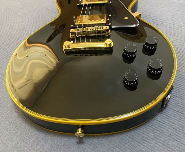 

Gloss Black Electric Guitar w/ Gold Binding & Humbuckers - Rock Elegance