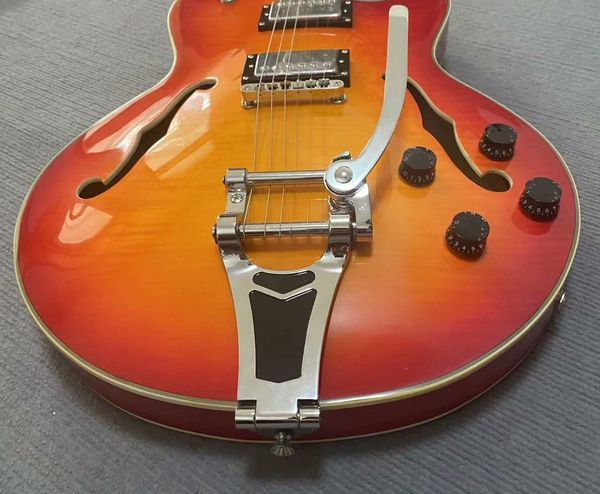 

Semi-Hollow Electric Guitar w/ Sunburst Finish & Vibrato Bridge - Jazz/Blues Ready