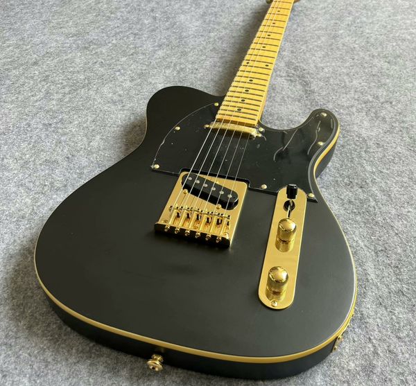 

Sleek Single-Cutaway Electric Guitar: Glossy Black Finish, Gold-Trimmed Edge, Gold Hardware