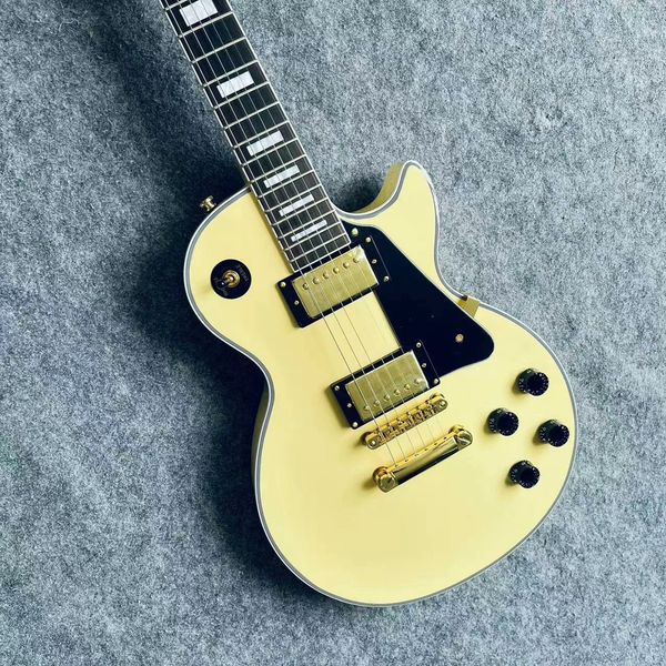 

Classic White Single-Cut Guitar: Gold Hardware, Black Guard & Rock Precision