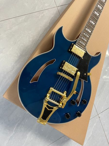

Blue Hollowbody Elegance - Gold Humbuckers & Retro Tremolo for Stage/Studio Versatility