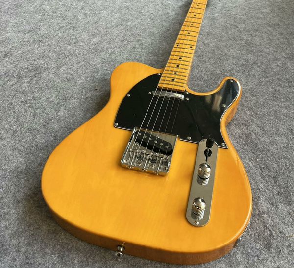 

Vintage-Style Single-Cut Electric Guitar: Warm Light Yellow Finish, Dual Single-Coil Pickups, Maple Neck