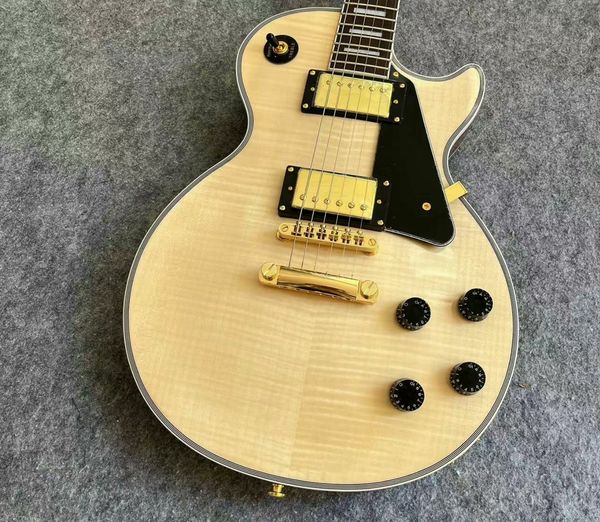 

Natural Wood Single-Cut Guitar: Gold Hardware, Black Guard & Rock Precision