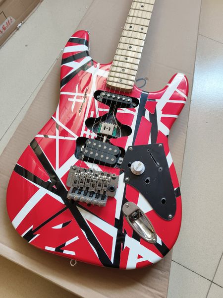 

Double-Cutaway Electric Guitar: Bold Red Finish with Black/White Geometric Patterns & Maple Neck
