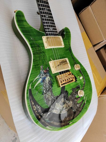 

Striking Green Electric Guitar with Dragon Design: Ergonomic Body, Gold - Plated Hardware, Ideal for Metal & Rock