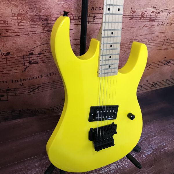 

Bold Yellow Superstrat-Style Guitar: Double-Cutaway Body, Maple Neck & Black Humbucker