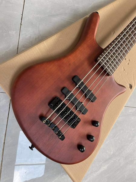 

Sleek Modern Bass Guitar: Warm Brown Wood Grain Finish, 3 Black Pickups & Metallic Bridge