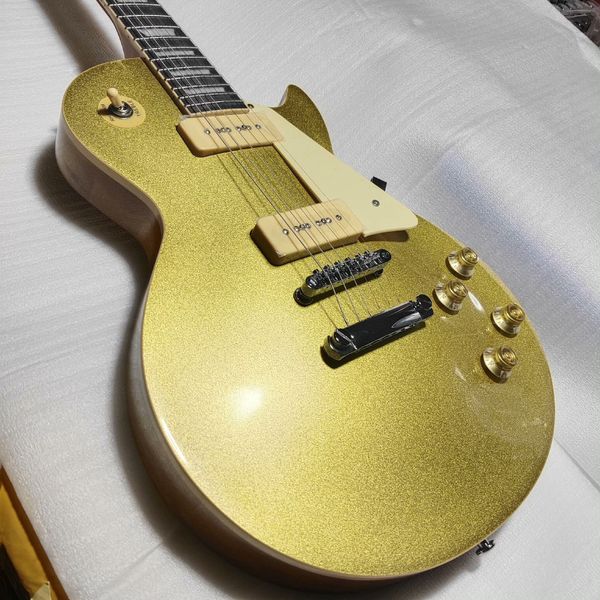 

Striking Glittery Gold Electric Guitar: Cream Pickguard, Dual Cream Humbuckers, Black Stop-Bar Bridge