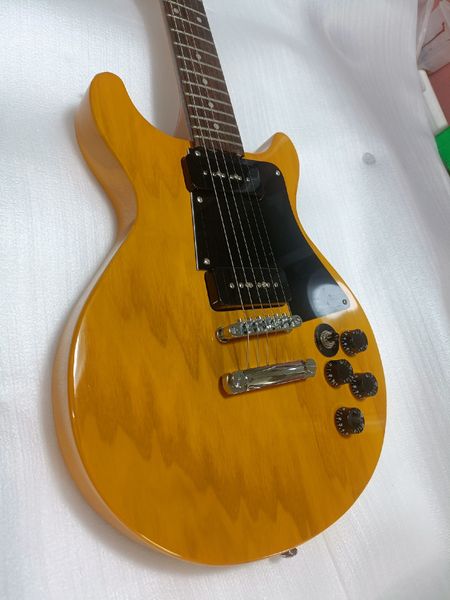 

Glossy Warm-Yellow Electric Guitar: Single-Cutaway, Black Pickguard, 5 Control Knobs