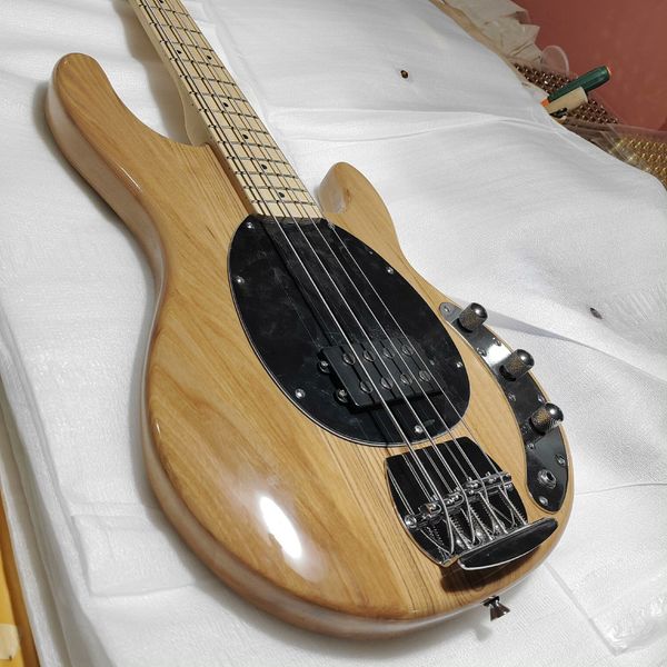 

Glossy Natural Wood Electric Bass: Maple Fretboard, Dual Pickups, Rustic Modern Design