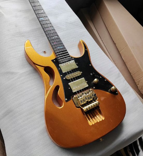 

Striking Gold-Orange/Green Gradient Semi-Hollow Guitar: F-Holes, 3 Metallic Humbuckers, Gold Hardware
