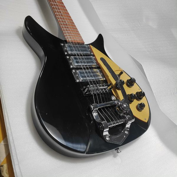 

Sleek Glossy-Black Electric Guitar: Yellow Pickguard, 3 Clear Humbuckers, Tremolo Bridge