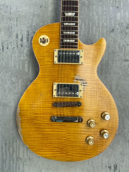 

Timeless Gold Flamed Maple Relic Single-Cut: Gold Humbuckers, Tune-O-Matic, Rhythm/Treble Toggle