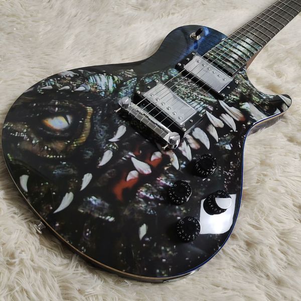 

Striking Glossy Electric Guitar: Mythical Creature Eye/Teeth Graphic, Dual Silver Humbuckers