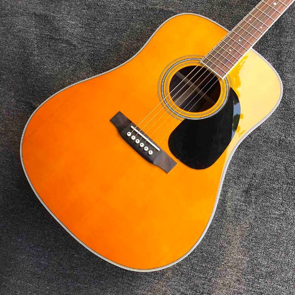 

Vibrant Orange Folk Guitar: Gloss Finish, Black Pickguard & Warm Acoustic Tones
