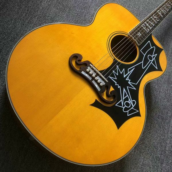 

Vibrant Yellow Folk Guitar with Star-Inlaid Pickguard & Warm Acoustic Resonance