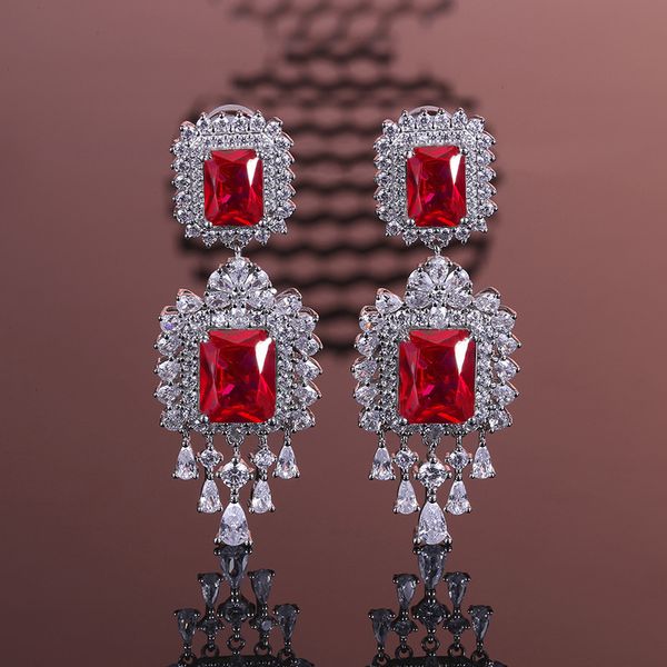 

Exquisite Handcrafted Statement Pieces - Modern Artisan Crafted Hoop Studs Complemented by Vivid Colored Synthetic Stones