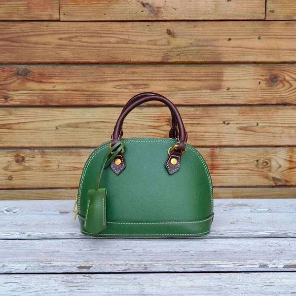 Italy imported cowhide mini shell handbag bag