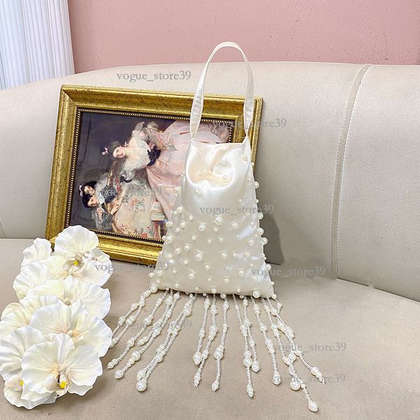 

Xiaoxiangfeng Xianqi Ly Gentle Pearl Tassel Leisure Bag Silk Silk Beed Romantic Handheld Shoulder Bag 20A, Ivory white