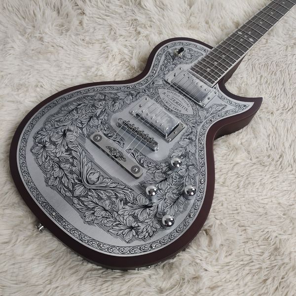 

Striking Black-White Floral Single-Cut Electric: Metallic Humbuckers, Spherical Metal Knobs, Artistic Vine Design