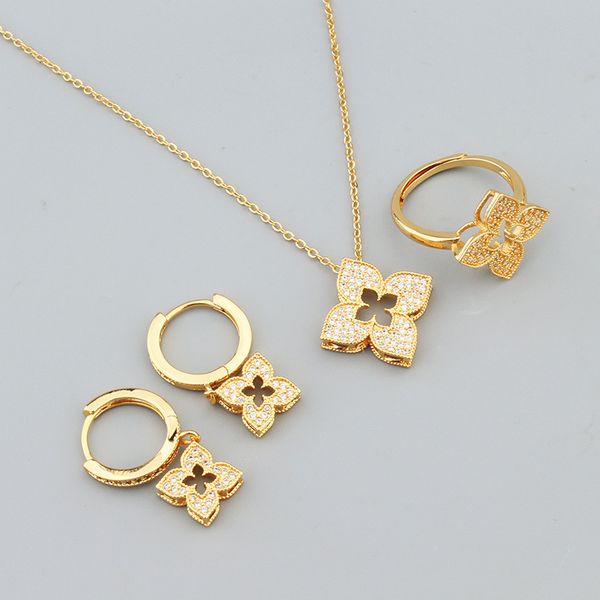 

Minimalist Fresh Hollow Full Diamond Lucky Clover Necklace Jewelry Three-Piece Set Gold-Plated Earrings Ring 33 1B, Golden
