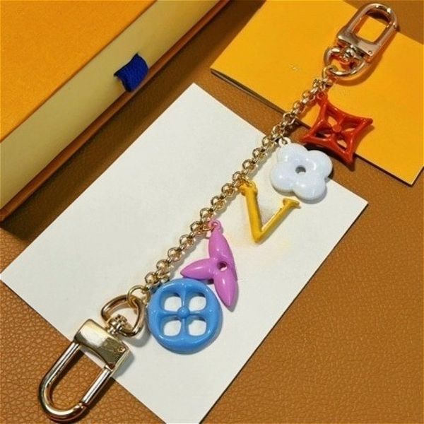 

Designer Keychains Stainless Steel Keychains Bag Charm for Men and Women Car Key Holders Keyring Bags Pendant High-Quality Couple Gift