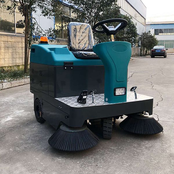 

User-Friendly Ride-On Sweeping Vehicle with Intuitive Controls and Adjustable Operator Seat