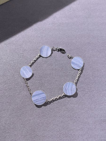 

Women's Designer Four-Leaf Clover Charm Bracelet: Intricate Pearlescent Finish Available in Multiple Colors