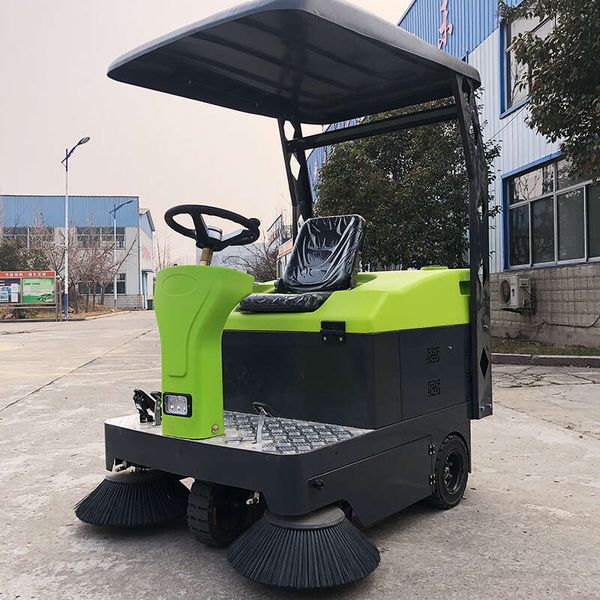 

High-Dump Ride-On Sweeper for Easy Unloading into Standard Trash Containers or Dumpsters
