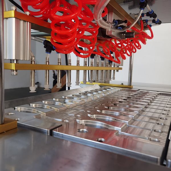 

YG Manufacturing Company - Turnkey Filling and Sealing Machine Solutions